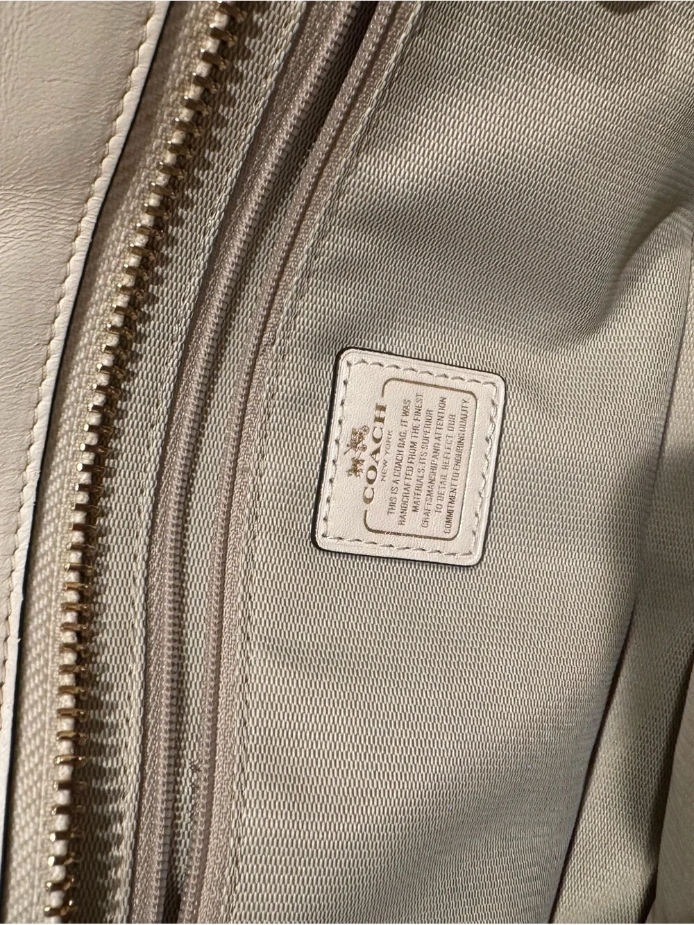 Coach polished gold wear